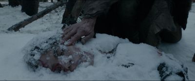 Still from The Revenant (2015) that has been tagged with: frozen & exterior & dead body