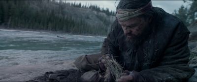 Still from The Revenant (2015) that has been tagged with: exterior & day & river & medium shot