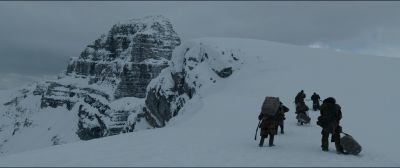 Still from The Revenant (2015) that has been tagged with: day & over-the-shoulder & exterior & hiking