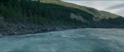 Still from The Revenant (2015) that has been tagged with: exterior & swimming