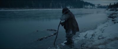 Still from The Revenant (2015) that has been tagged with: day & snow & exterior & fishing & river
