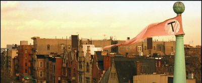 Still from The Royal Tenenbaums (2001) that has been tagged with: wide shot & flag & day