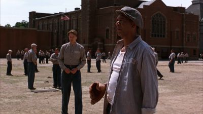 Still from The Shawshank Redemption (1994) that has been tagged with: prison yard & exterior & prison & day