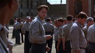 Still from The Shawshank Redemption (1994) that has been tagged with: prison yard & prison & day & exterior
