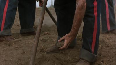 Still from The Shawshank Redemption (1994) that has been tagged with: day & working & exterior & hand & rocks