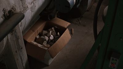 Still from The Shawshank Redemption (1994) that has been tagged with: warehouse & rocks