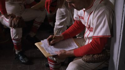 Still from The Shawshank Redemption (1994) that has been tagged with: writing & locker room