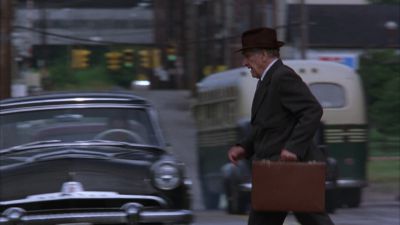 Still from The Shawshank Redemption (1994) that has been tagged with: street & car