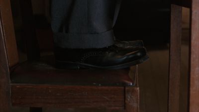 Still from The Shawshank Redemption (1994) that has been tagged with: interior & shoes & insert & day