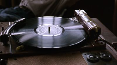 Still from The Shawshank Redemption (1994) that has been tagged with: day & insert & record player