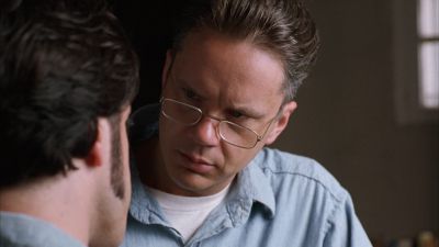 Still from The Shawshank Redemption (1994) that has been tagged with: interior & glasses & day