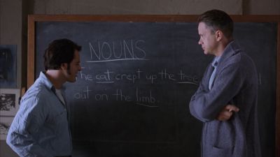 Still from The Shawshank Redemption (1994) that has been tagged with: day & blackboard & interior & classroom & medium wide