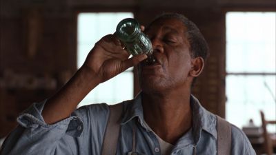 Still from The Shawshank Redemption (1994) that has been tagged with: drinking & woodshop