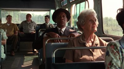 Still from The Shawshank Redemption (1994) that has been tagged with: 714f38 & day & bus & group-shot