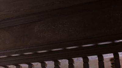 Still from The Shawshank Redemption (1994) that has been tagged with: interior & day & graffiti