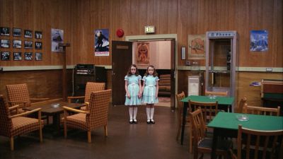 Still from The Shining (1980) that has been tagged with: wide shot & twins & interior