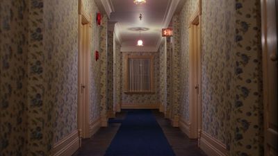 Still from The Shining (1980) that has been tagged with: hotel & one-point-perspective & day & hallway & interior