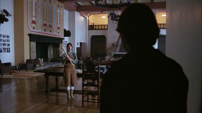 Still from The Shining (1980) that has been tagged with: day & wide shot & baseball bat & interior & hotel lobby
