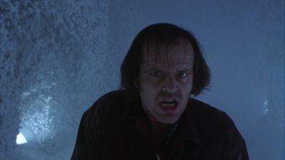 Still from The Shining (1980) that has been tagged with: exterior & medium close-up & clean single & snow & night