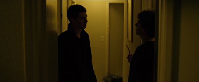 Still from The Social Network (2010) that has been tagged with: two-shot & hallway & over-the-shoulder & interior