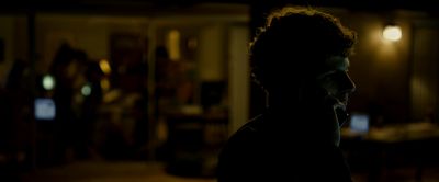 Still from The Social Network (2010) that has been tagged with: 7a3f00 & clean single & medium shot & interior