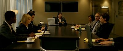 Still from The Social Network (2010) that has been tagged with: table & meeting & interior & wide shot
