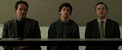 Still from The Social Network (2010) that has been tagged with: day & interior & medium wide & low-angle & three-shot