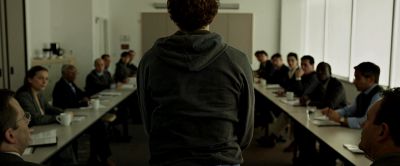 Still from The Social Network (2010) that has been tagged with: 000000 & over-the-shoulder & meeting & day
