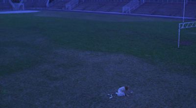 Still from The Virgin Suicides (1999) that has been tagged with: 24297b & high-angle & wide shot & football field & exterior