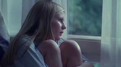 Still from The Virgin Suicides (1999) that has been tagged with: 6f8090 & interior & medium close-up