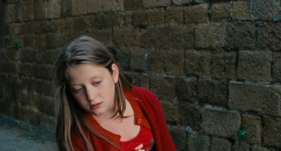 Still from The Wonders (2014) that has been tagged with: child & brick wall