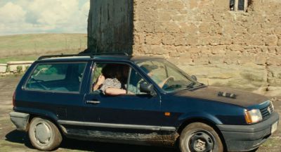 Still from The Wonders (2014) that has been tagged with: group-shot & car