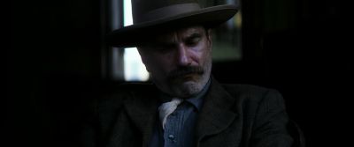 Still from There Will Be Blood (2007) that has been tagged with: day & medium close-up & hat & period
