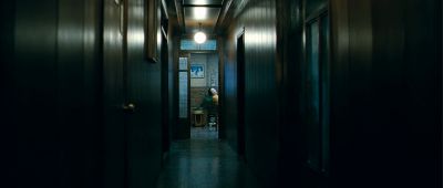 Still from Thirst (2009) that has been tagged with: 000000 & wide shot & peeking & hallway