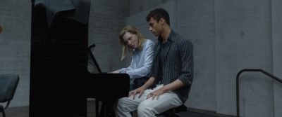 Still from Tár (2022) that has been tagged with: piano & two-shot