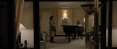 Still from Tár (2022) that has been tagged with: interior & wide shot & piano