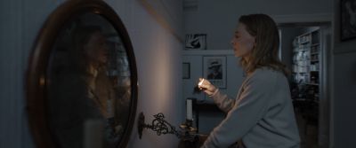 Still from Tár (2022) that has been tagged with: candles