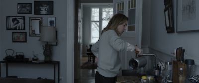Still from Tár (2022) that has been tagged with: kitchen & pouring