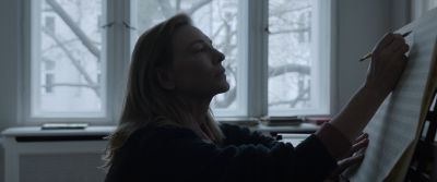 Still from Tár (2022) that has been tagged with: day & profile shot & piano