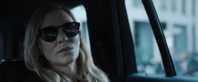 Still from Tár (2022) that has been tagged with: car & sunglasses