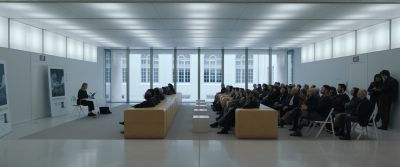 Still from Tár (2022) that has been tagged with: conference room