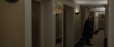 Still from Tár (2022) that has been tagged with: 4a3621 & hotel & hallway & wide shot