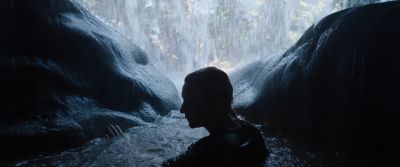 Still from Tár (2022) that has been tagged with: clean single & waterfall & exterior