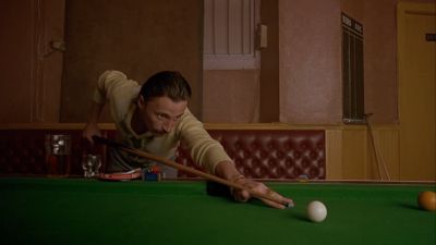Still from Trainspotting (1996) that has been tagged with: interior & medium wide & day & pool table & clean single