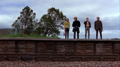 Still from Trainspotting (1996) that has been tagged with: train track & group-shot
