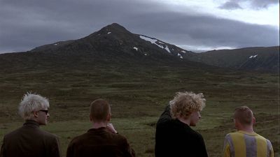 Still from Trainspotting (1996) that has been tagged with: mountains & over-the-shoulder
