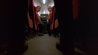 Still from Trainspotting (1996) that has been tagged with: interior & train interior & looking back & over-the-shoulder & day & train