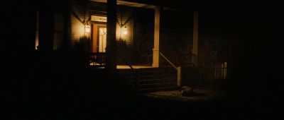 Still from True Grit (2007) that has been tagged with: e9d66d & night & wide shot & exterior