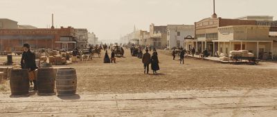 Still from True Grit (2007) that has been tagged with: establishing shot & extreme wide & western town