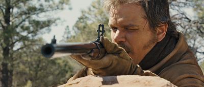 Still from True Grit (2007) that has been tagged with: day & exterior & sniper & close-up & gun